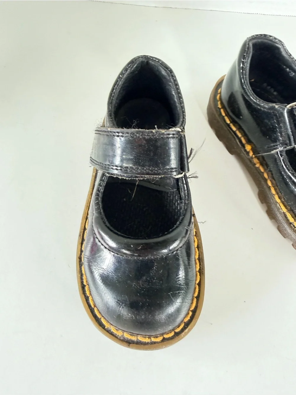 Dr. Martens Kids Black Mary Jane Shoes with Yellow Stitching